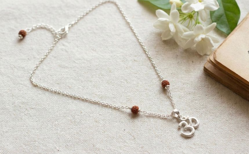 Silver chain with Rudraksha beads showing benefit of wearing silver chain for health and positivity