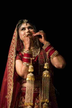 Bridal dupatta style done right: the dupatta completes the look, carries ceremonial meaning, and moves beautifully in photographs.