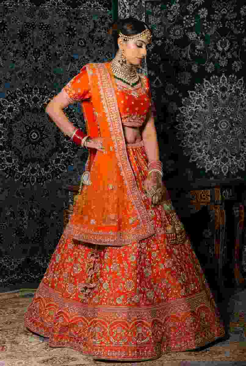 Front drape (Seedha Pallu) bridal dupatta style: keeps the embroidery facing forward and visible in full-length portraits.